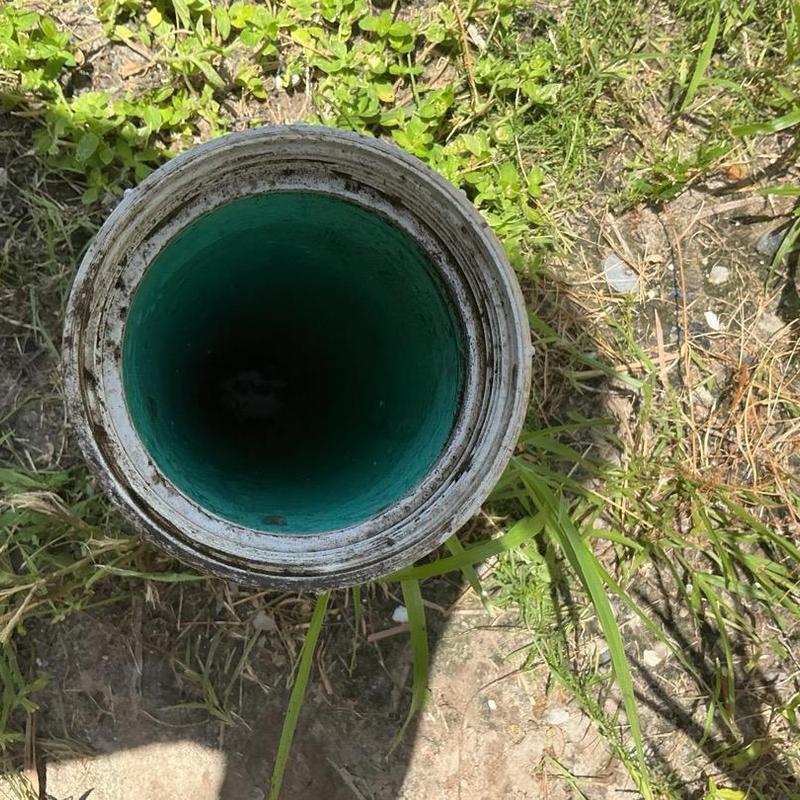 Sewer main cleanout pipe opening outdoors Sewer main cleanout pipe opening outdoors