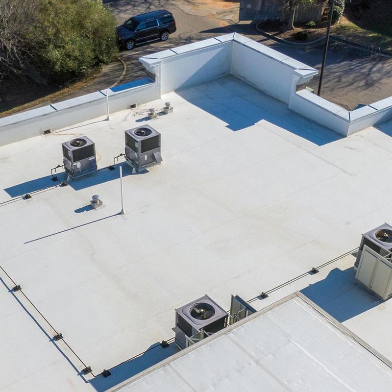 Flat commercial roofing system with HVAC units Flat commercial roofing system with HVAC units