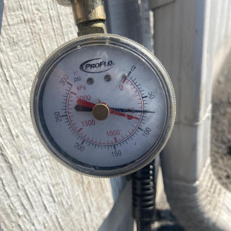 Pressure gauge on outdoor plumbing system Pressure gauge on outdoor plumbing system