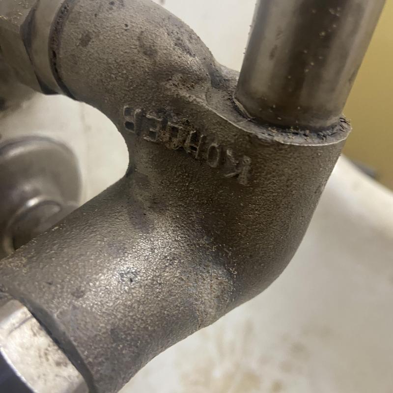 Faucet pipe fitting with corrosion in break room sink Faucet pipe fitting with corrosion in break room sink