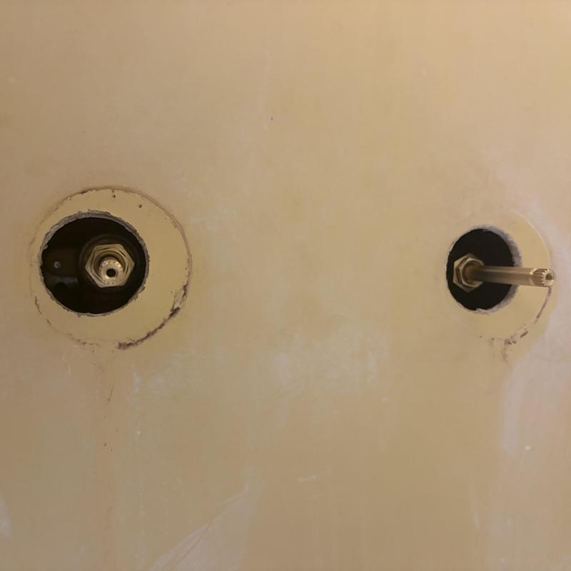 Two-handle shower faucet valve stems in wall Two-handle shower faucet valve stems in wall