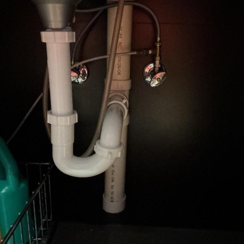 Kohler faucet supply lines and drain pipes under sink Kohler faucet supply lines and drain pipes under sink