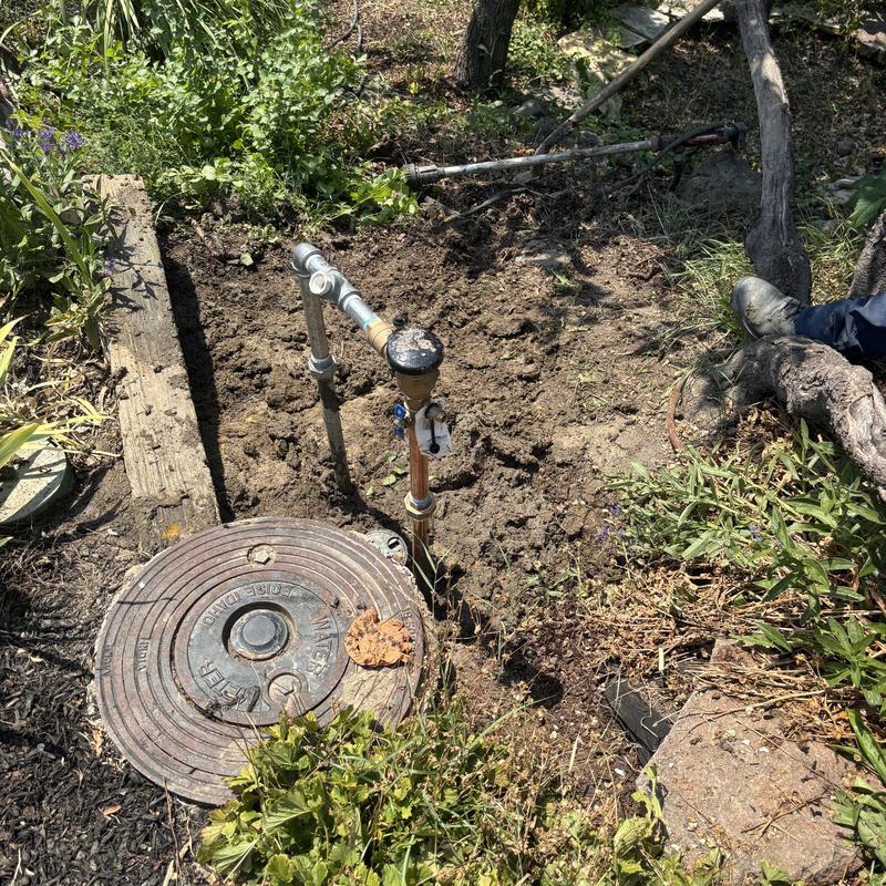 Backflow preventer and water riser replacement outdoors Backflow preventer and water riser replacement outdoors