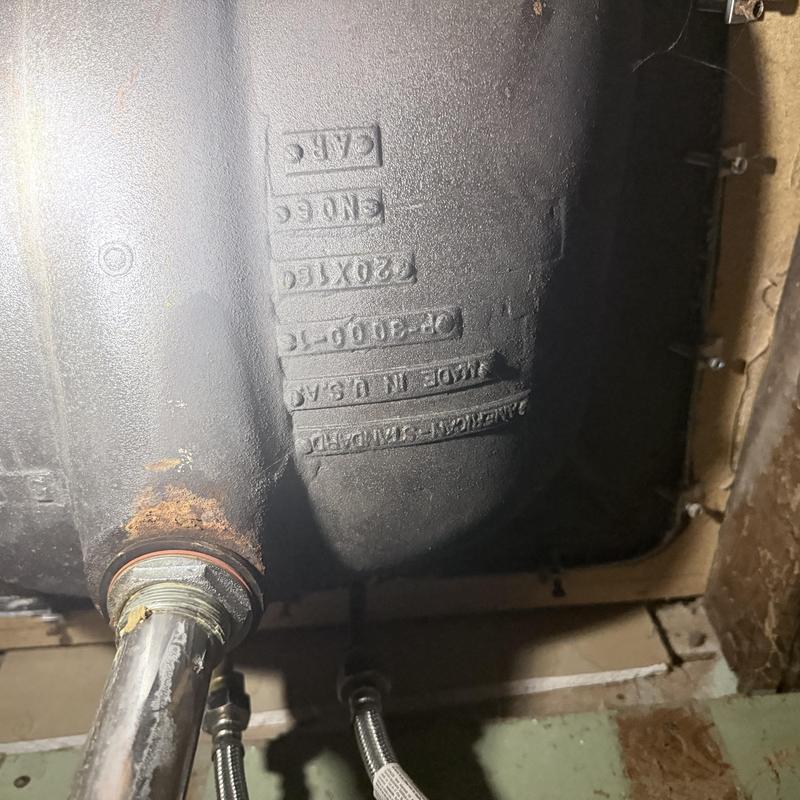 Sink drain pipe with rust and leak inspection under sink Sink drain pipe with rust and leak inspection under sink