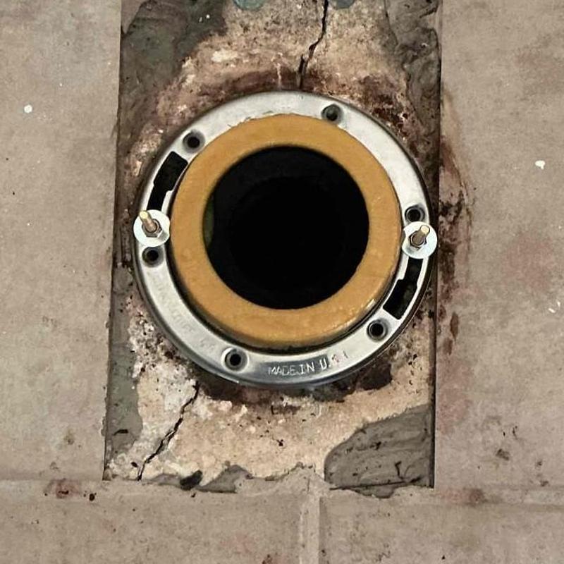Toilet flange cut and prepared for new installation Toilet flange cut and prepared for new installation