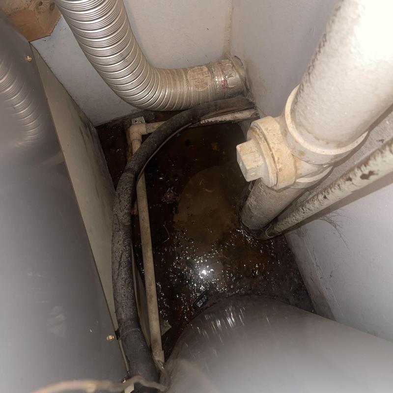 Air handler drain line with water pooling and pipes