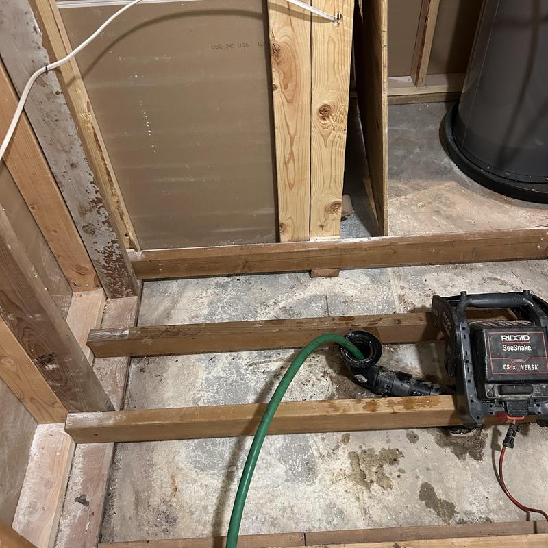 Shower drain with Ridgid SeeSnake drain cable system Shower drain with Ridgid SeeSnake drain cable system