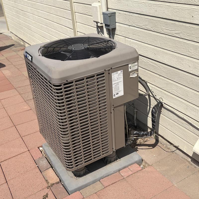 Outdoor York heat pump with new capacitor installed