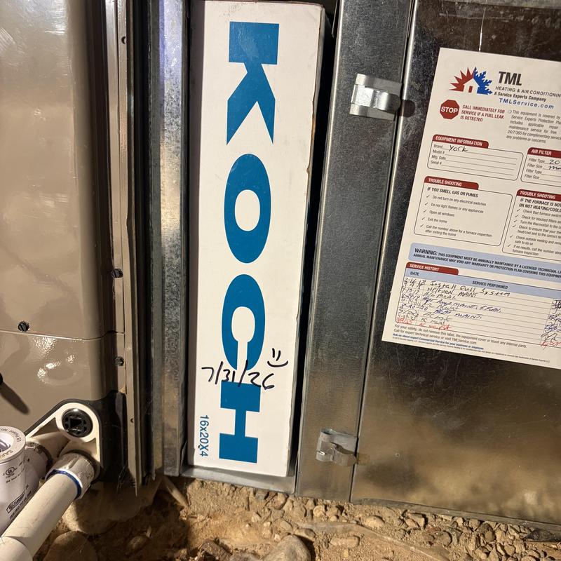 Air filter replaced in electric furnace crawl space