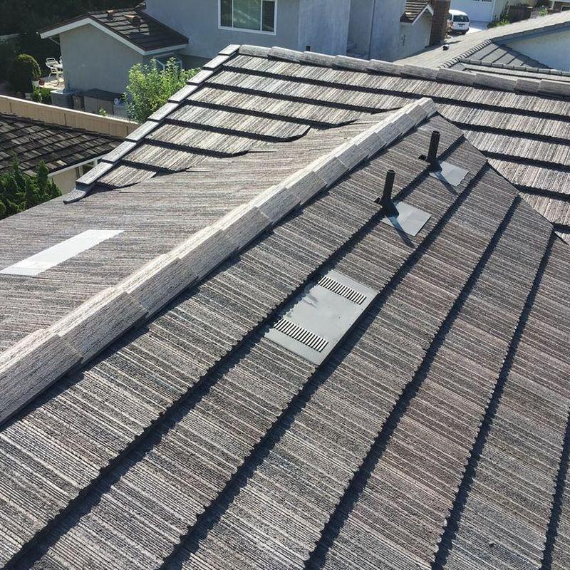 Tile roof with ridge vent and plumbing vents inspection Tile roof with ridge vent and plumbing vents inspection