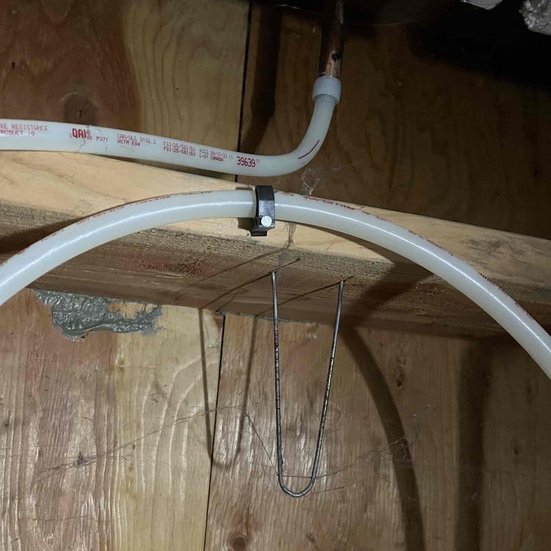 PEX water piping with copper fittings in crawlspace PEX water piping with copper fittings in crawlspace