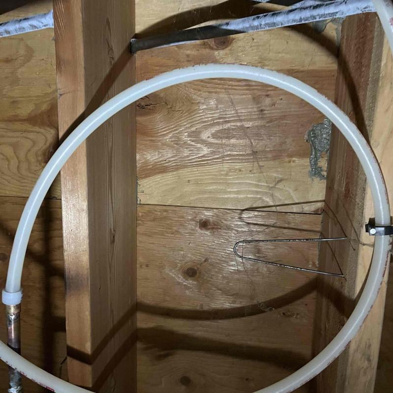 PEX piping with service loop installed in crawlspace PEX piping with service loop installed in crawlspace
