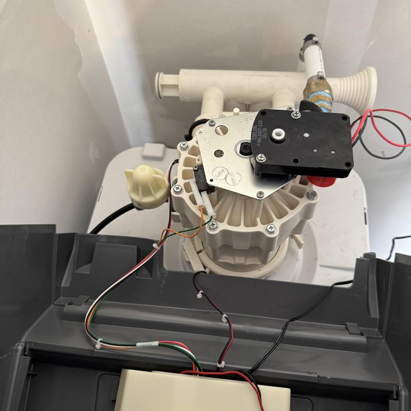 Water softener drain motor with wiring and manifold removed Water softener drain motor with wiring and manifold removed