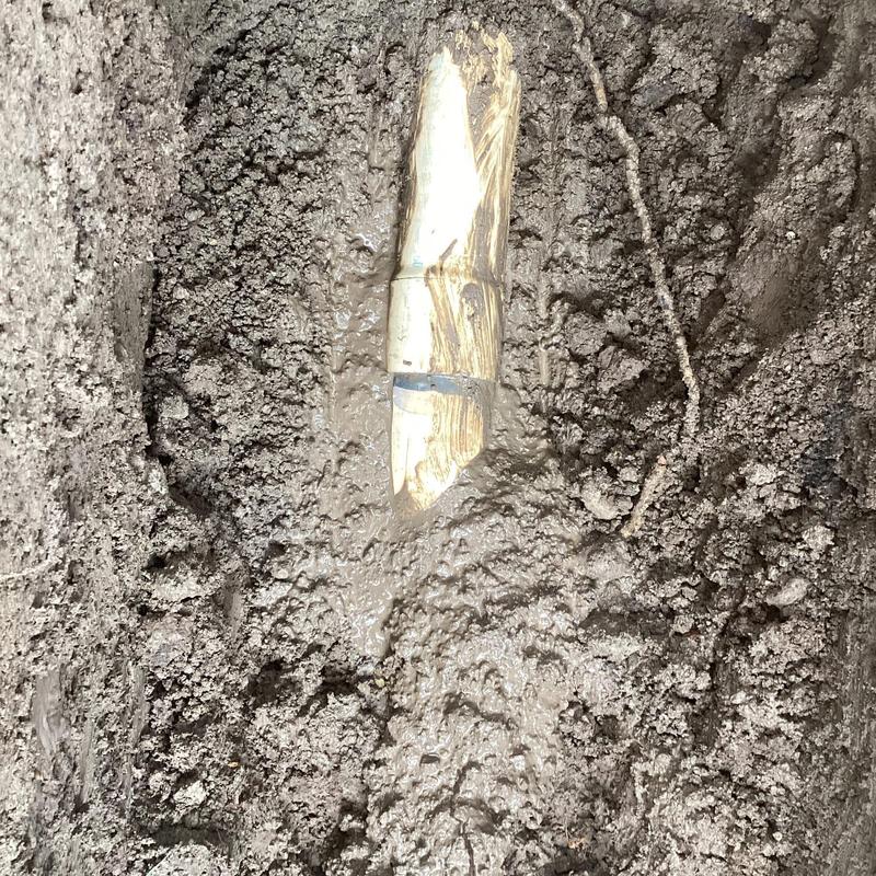 Leaking main waterline PVC pipe repair in muddy trench Leaking main waterline PVC pipe repair in muddy trench