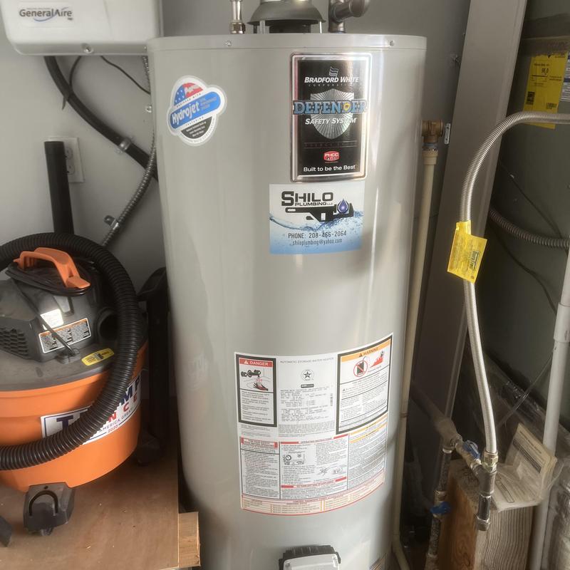 Water heater with replaced control valve and thermocouple Water heater with replaced control valve and thermocouple