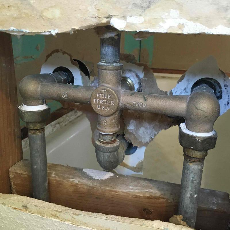 Shower valve plumbing rough-in with exposed pipe fittings Shower valve plumbing rough-in with exposed pipe fittings