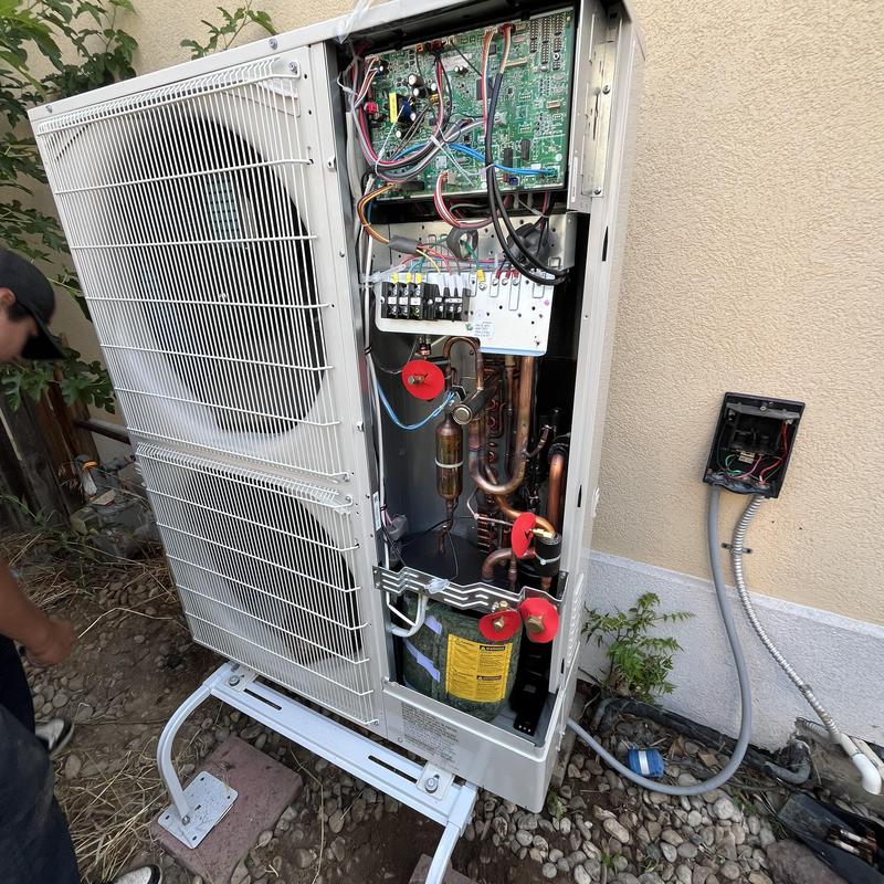 Mitsubishi hyper heat outdoor unit with open panel Mitsubishi hyper heat outdoor unit with open panel