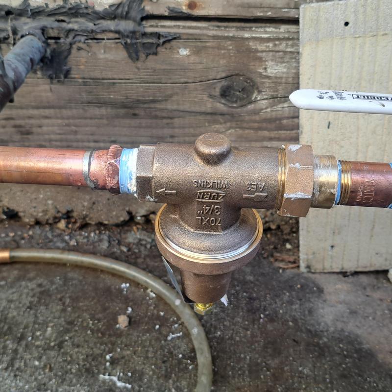Pressure relief valve on irrigation main manifold