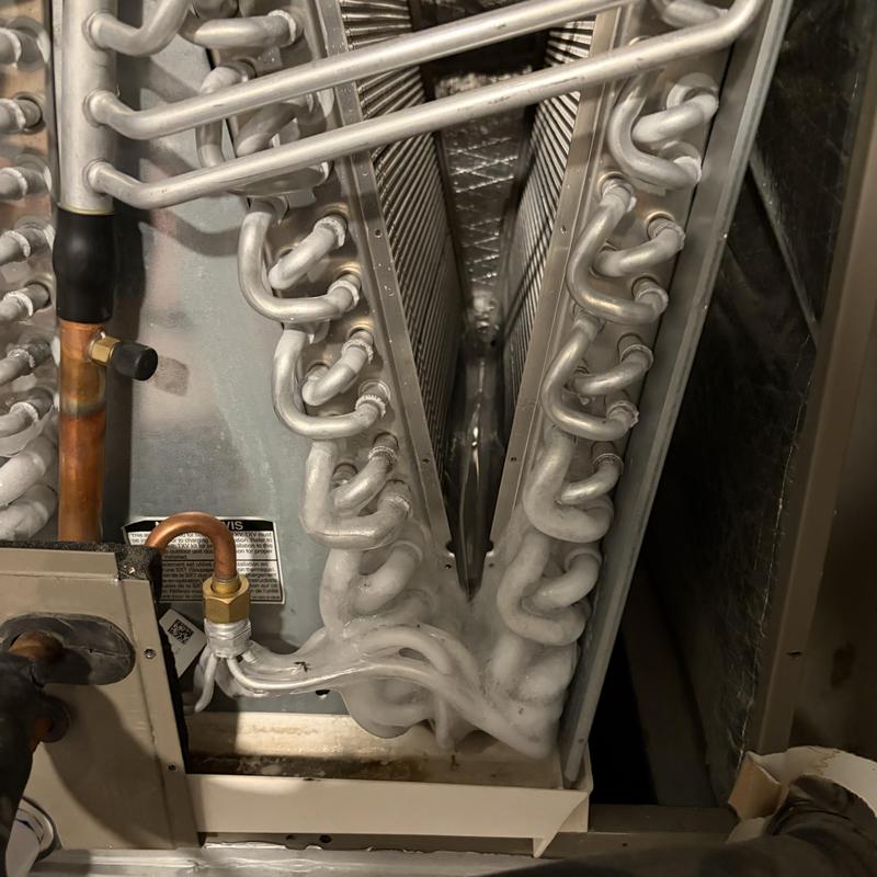 Evaporator coil with frost buildup in HVAC system Evaporator coil with frost buildup in HVAC system