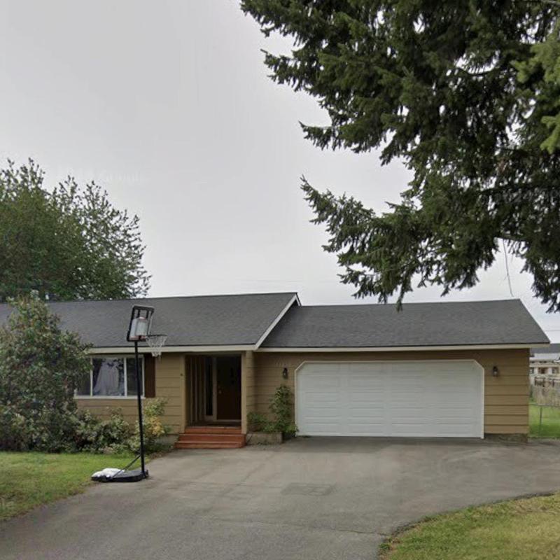 Garage roof shingles blown off with loose edge metal Garage roof shingles blown off with loose edge metal