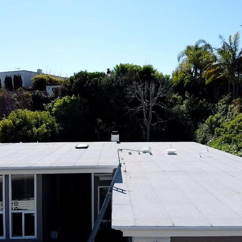 Flat roof installation on residential house in Westminster CA Flat roof installation on residential house in Westminster CA