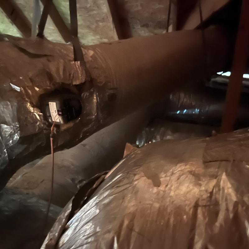 HVAC ductwork with repaired Zone 1 dampers in attic HVAC ductwork with repaired Zone 1 dampers in attic