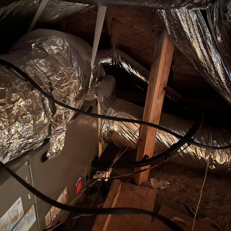 HVAC ductwork and dampers in attic space HVAC ductwork and dampers in attic space