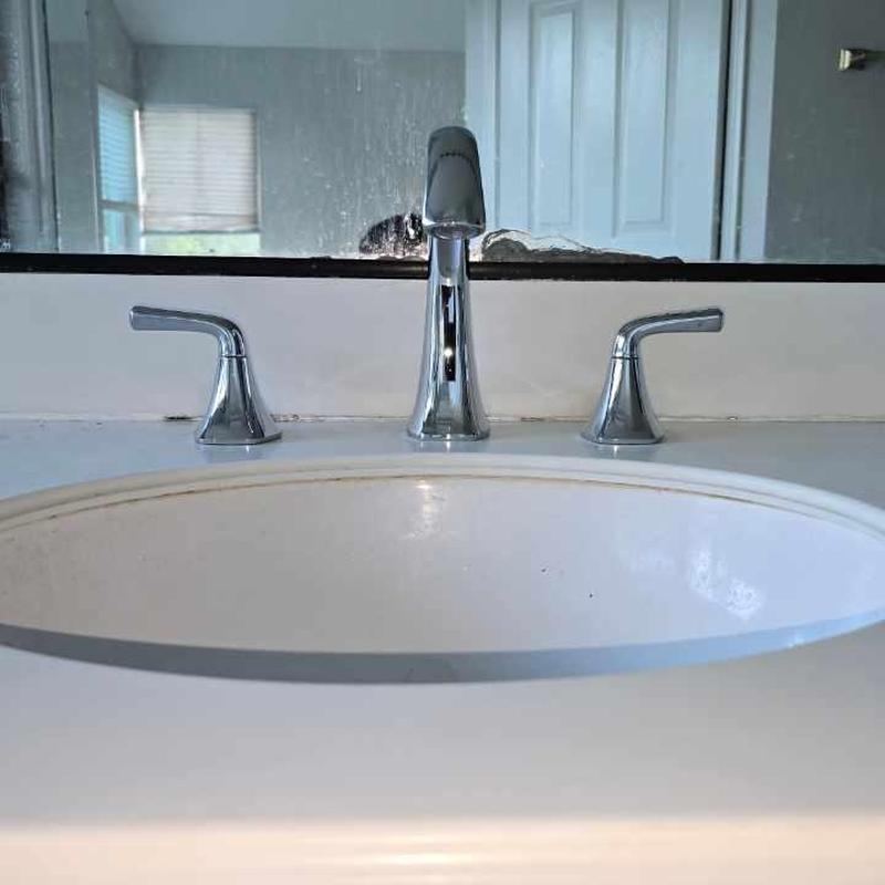 Chrome widespread bathroom sink faucet with handles