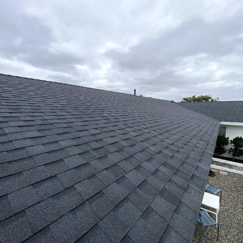 Asphalt shingle roof installation with new shingles Asphalt shingle roof installation with new shingles