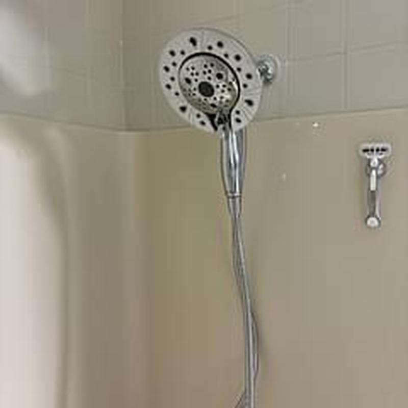 Delta handheld shower head with wall mount bracket