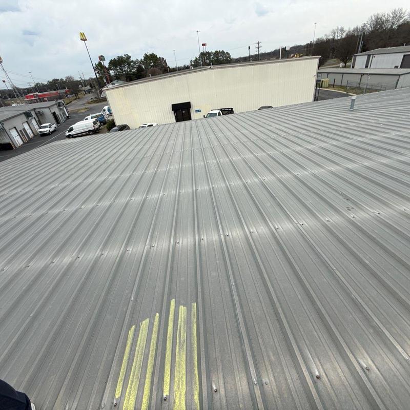 Metal roof panels with hail damage markings