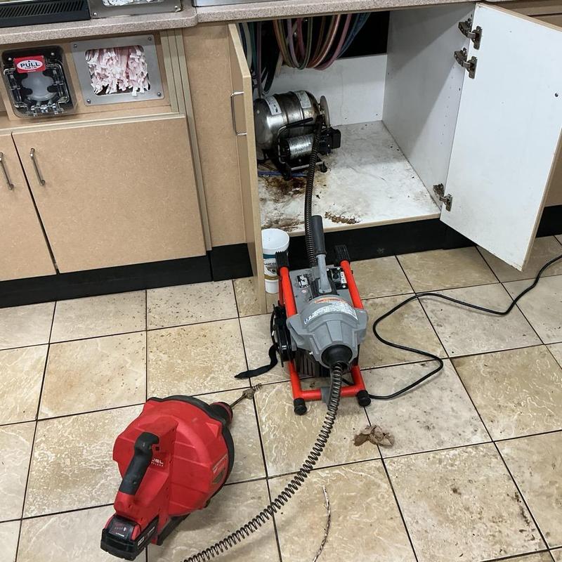 Floor drain snaking with vacuum and electric auger tools Floor drain snaking with vacuum and electric auger tools