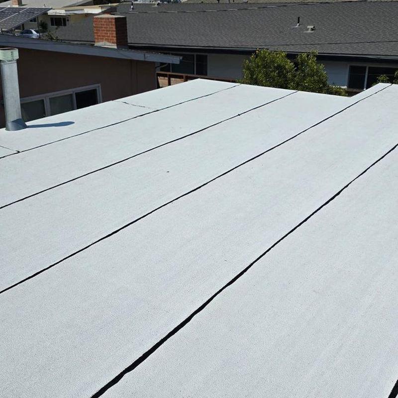 Flat roofing membrane installation on residential building Flat roofing membrane installation on residential building