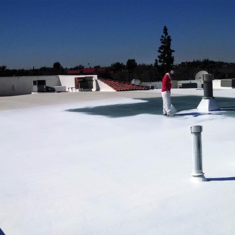 White roof coating application on flat commercial roof White roof coating application on flat commercial roof