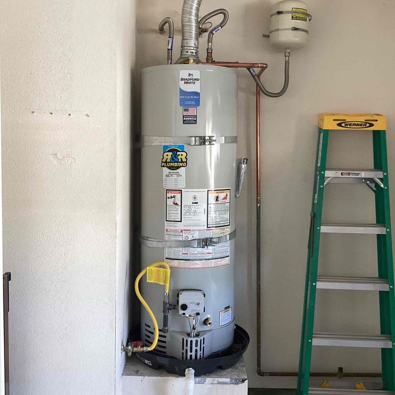Bradford White water heater installation in utility room