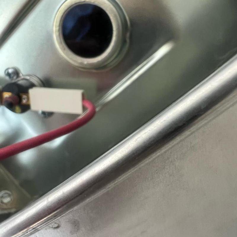 Gas control valve on water heater close-up with wiring Gas control valve on water heater close-up with wiring