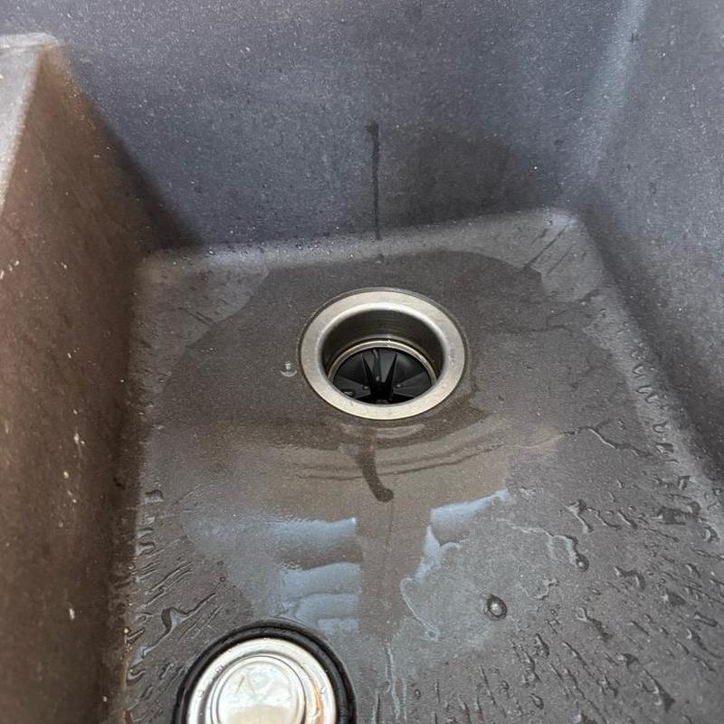 Garbage disposal flange in wet kitchen sink Garbage disposal flange in wet kitchen sink