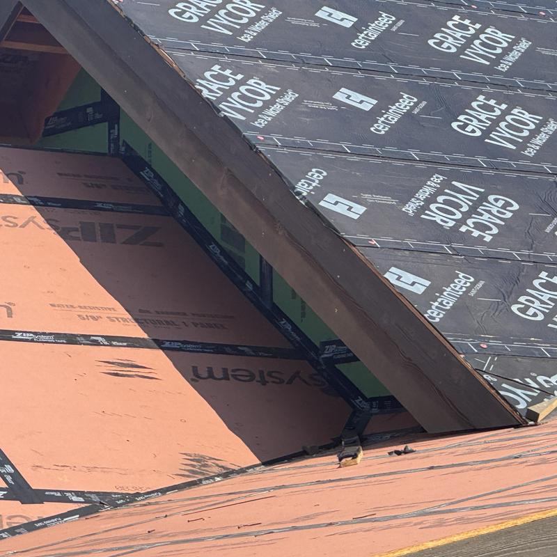 Roof underlayment installation on pitched roof Roof underlayment installation on pitched roof