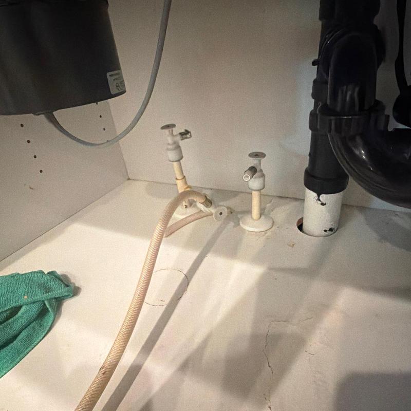 Plastic push pull water supply stops under sink Plastic push pull water supply stops under sink