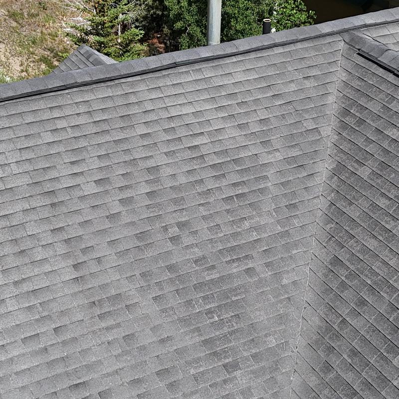 Asphalt shingle roof with valley flashing detail Asphalt shingle roof with valley flashing detail