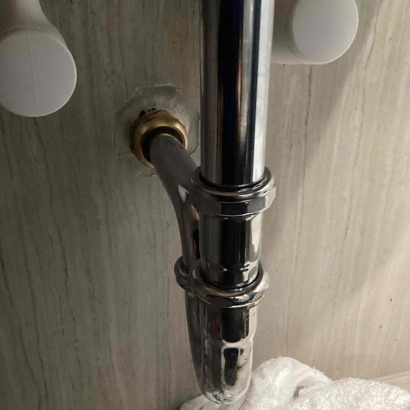 Bathroom sink drain piping and trap under sink Bathroom sink drain piping and trap under sink