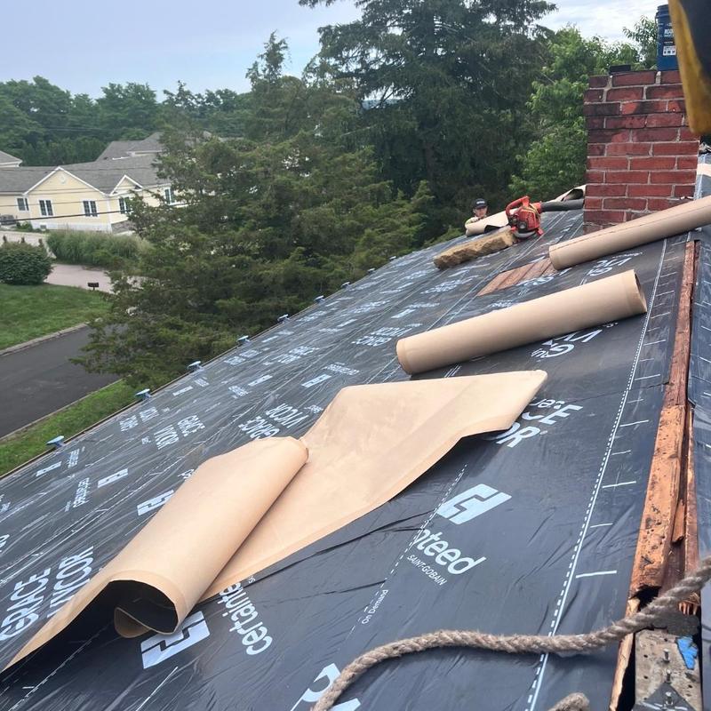 CertainTeed roofing underlayment installation on roof CertainTeed roofing underlayment installation on roof