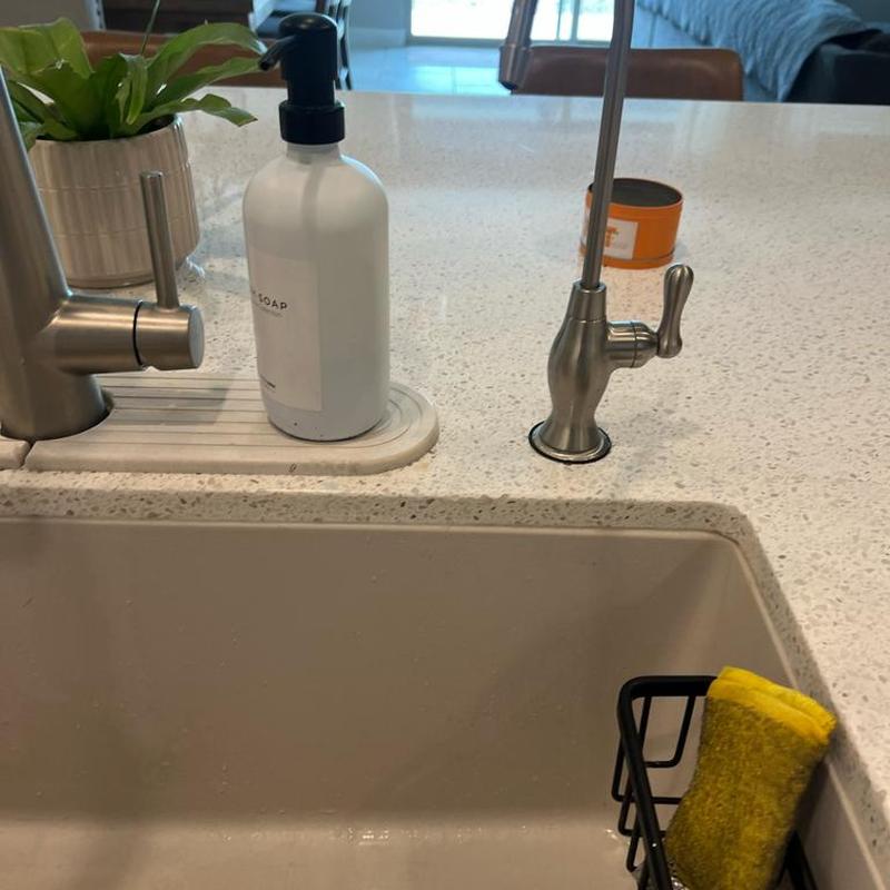 Reverse osmosis faucet and kitchen sink area Reverse osmosis faucet and kitchen sink area