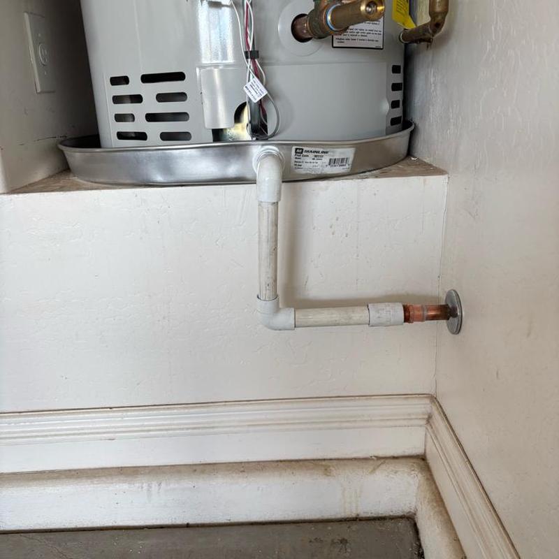 Water heater drain line and leak pan installation Water heater drain line and leak pan installation