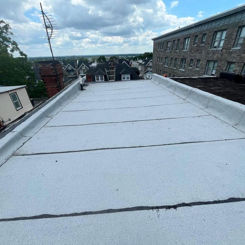 Firestone Modified Bitumen flat roof system installation Firestone Modified Bitumen flat roof system installation