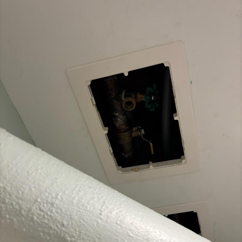Water heater valve and pipe access panel in ceiling Water heater valve and pipe access panel in ceiling