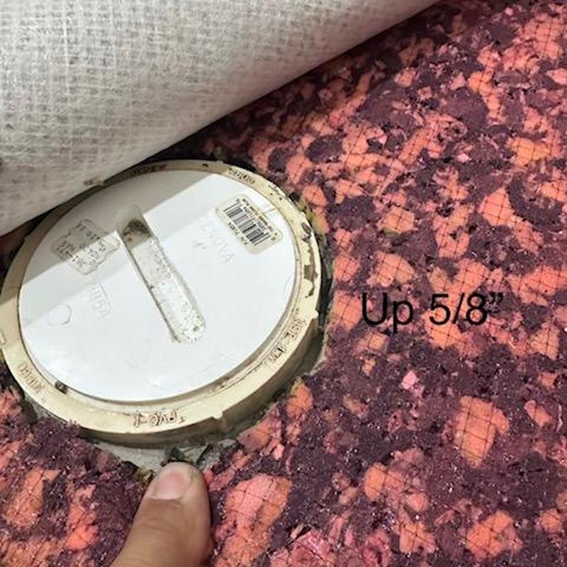 PVC cleanout cap adjustment with underlayment lifted PVC cleanout cap adjustment with underlayment lifted
