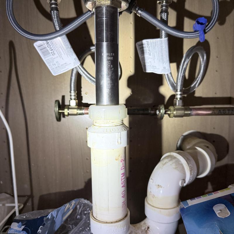 Double vanity faucet supply lines and drain piping