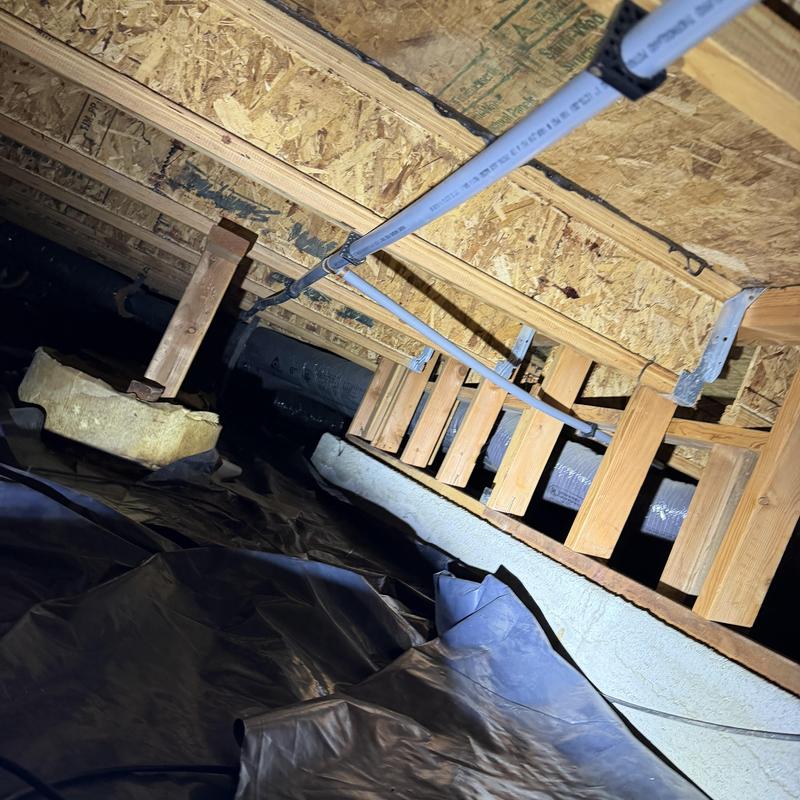 PEX water piping installed in crawl space ceiling