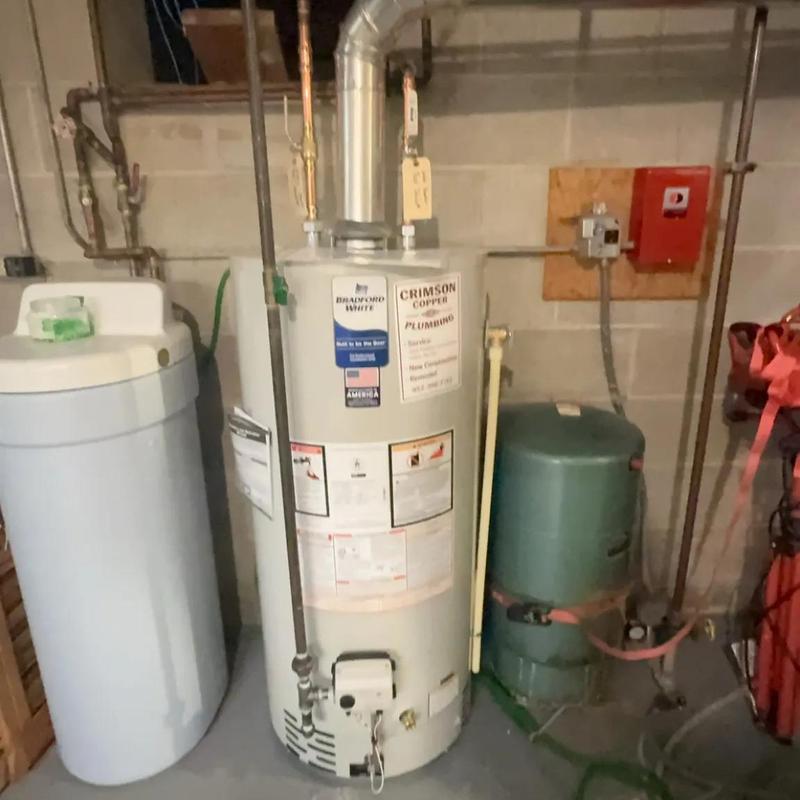 Water heater and main shutoff valve installation in basement Water heater and main shutoff valve installation in basement